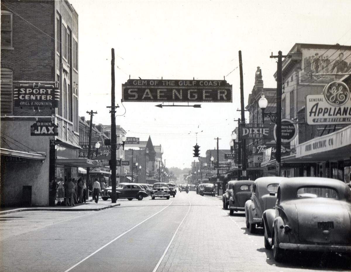 A large, lighted street sign declaring “Gem of the Gulf Coast” pointed to the Saenger Theater when it opened in Biloxi in January 1929.