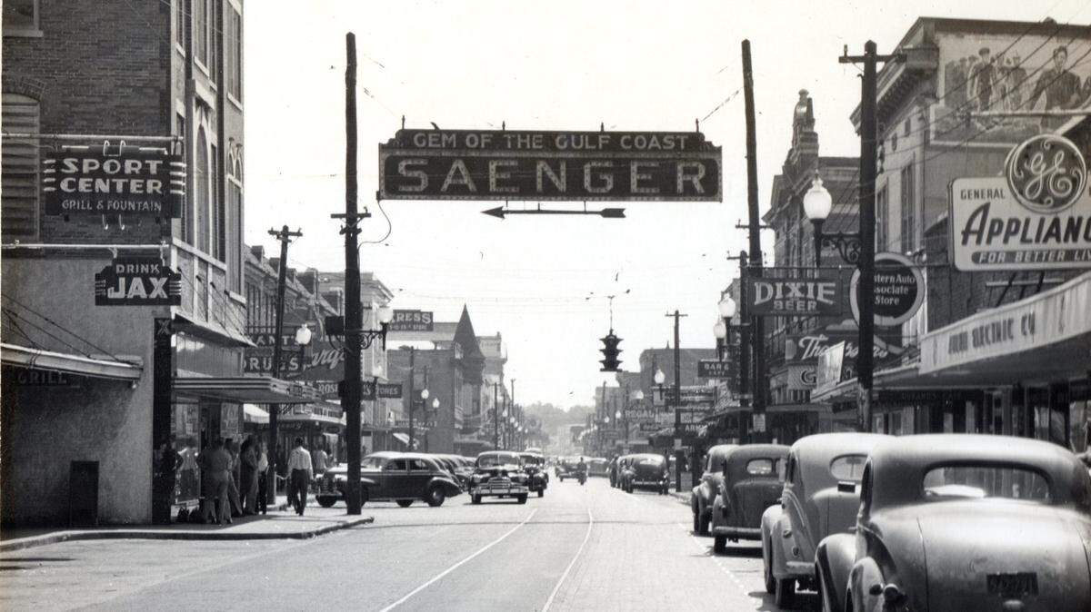 A large, lighted street sign declaring “Gem of the Gulf Coast” pointed to the Saenger Theater when it opened in Biloxi in January 1929.