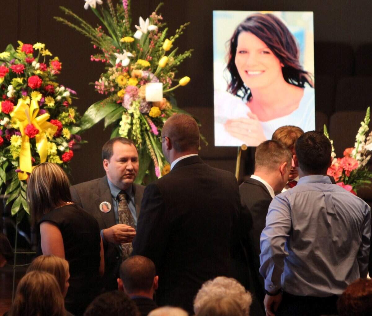 Gulfport Police Chief Allan Weatherford meets friends and family prior to the funeral of his daughter, DeAnna Tucker, at First Baptist Church in Long Beach. Tucker was killed by a drunk driver while getting into her car at a store.