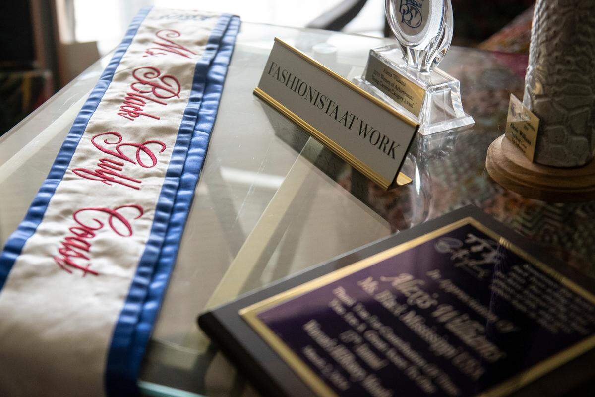 Some of the awards Alexis “Lexi” Williams, the reining Miss Black Mississippi, has won including her Miss Black Gulf Coast sash at her home in Gulfport on Wednesday, July 12, 2023.