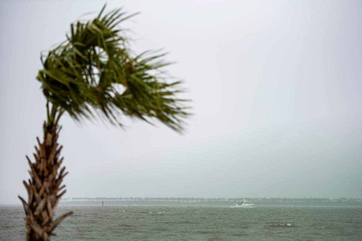 Wind and rain comes down along the MS Coast in Ocean Springs on Friday, Aug. 27, 2021.