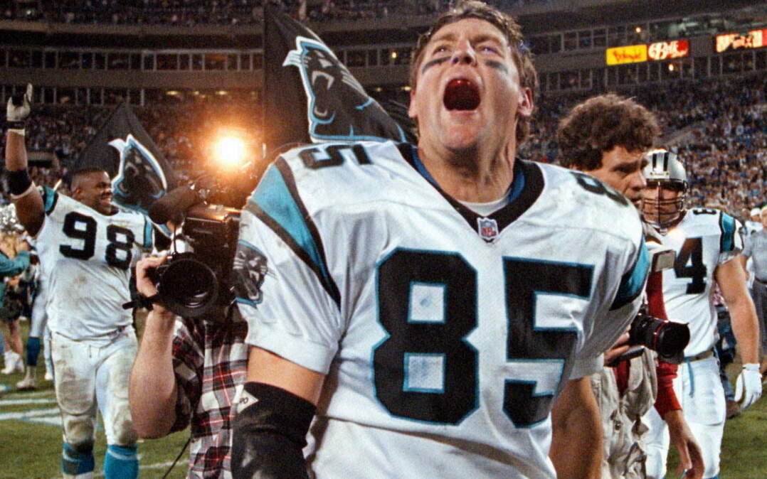Carolina Panthers tight end Wesley Walls (85) cries out in celebration of the Panthers 26-17 win over the Dallas Cowboys at Ericsson Stadium in Charlotte, N.C., Sunday, Jan. 5, 1997 during the NFC Divisional Playoff. (AP Photo Chuck Burton)
