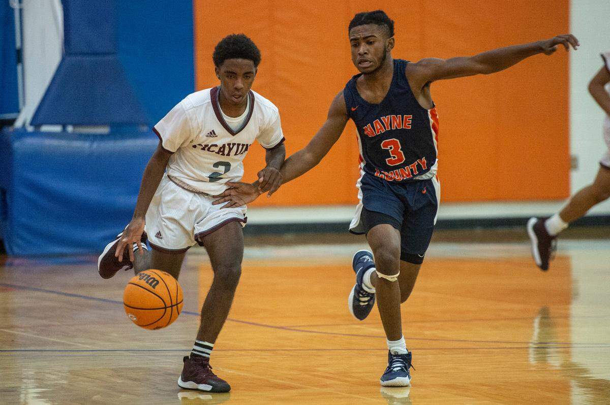 Picayune’s Josh Holmes dribbles the ball down the court during a matchup with Wayne County during the Adidas Holiday Classic at Gulfport High School in Gulfport on Tuesday, Dec. 28, 2021.