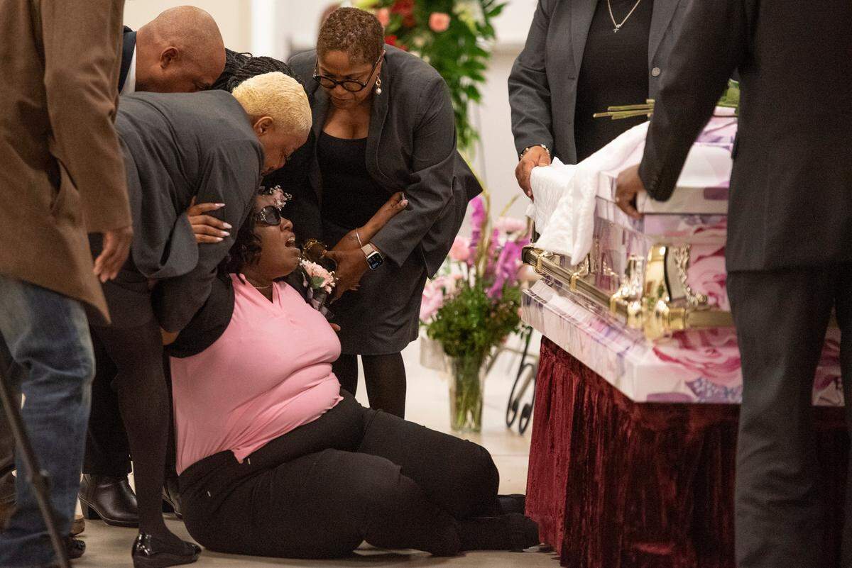 Melissa Dedeaux, mother of Ni’Kyra Dedeaux, collapses as her daughter’s casket is closed during her funeral at Lyman Community Center in Gulfport on Friday, Jan. 10, 2025. Ni’Kyra Dedeaux was killed in an alleged terrorist attack on Bourbon Street in New Orleans on Jan. 1.