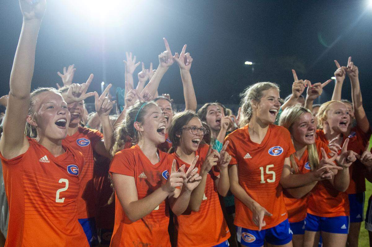 Members of the Gulfport girls soccer team celebrate after winning the 6A South State Championship game against Ocean Springs in Gulfport on Tuesday, Jan. 31, 2023. The team will advance to the state championship.