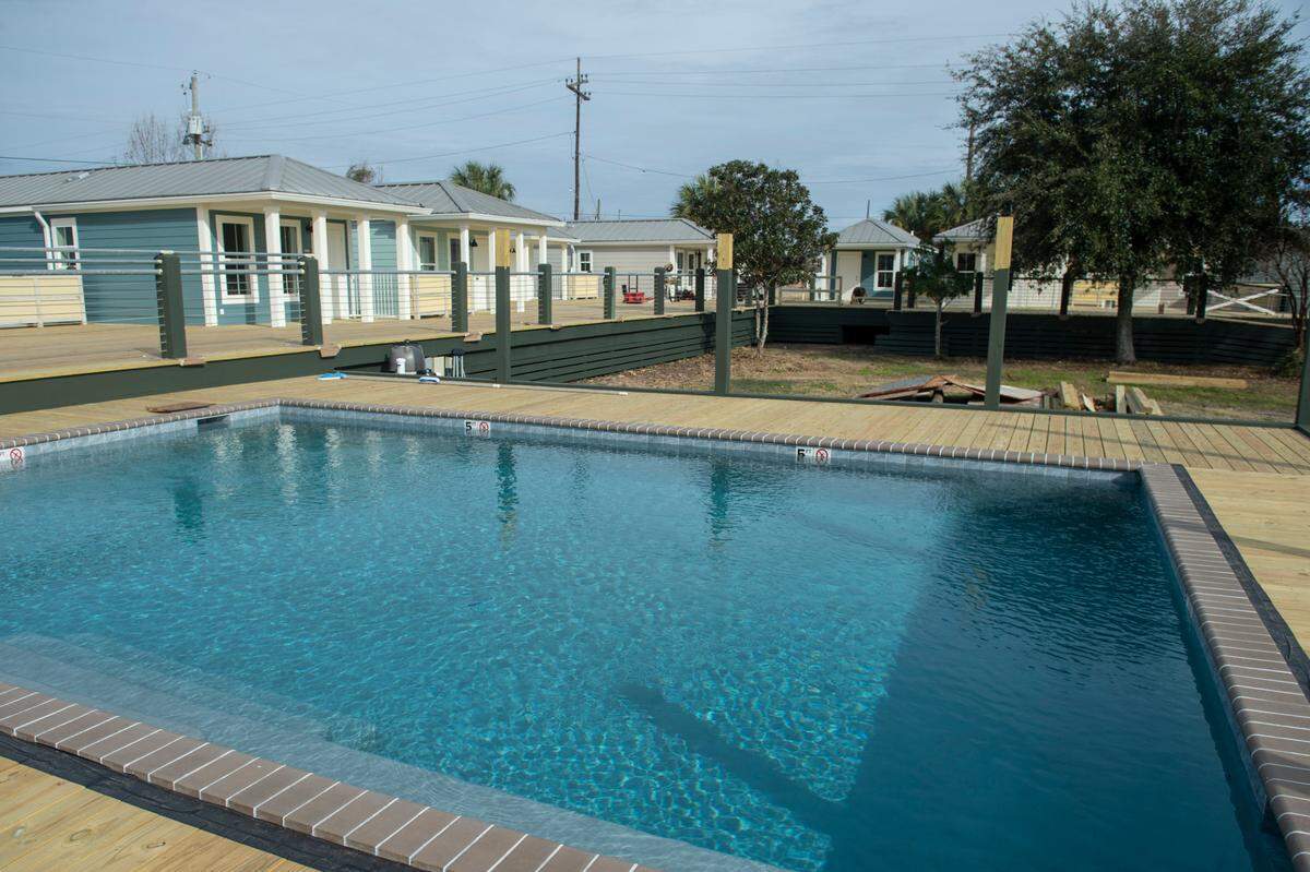 A new swimming pool is one of the amenities at the new Cottages at Depot housing development in Pascagoula, along with being able to walk to shops, restaurants, the river and the train depot that will become a brew pub,