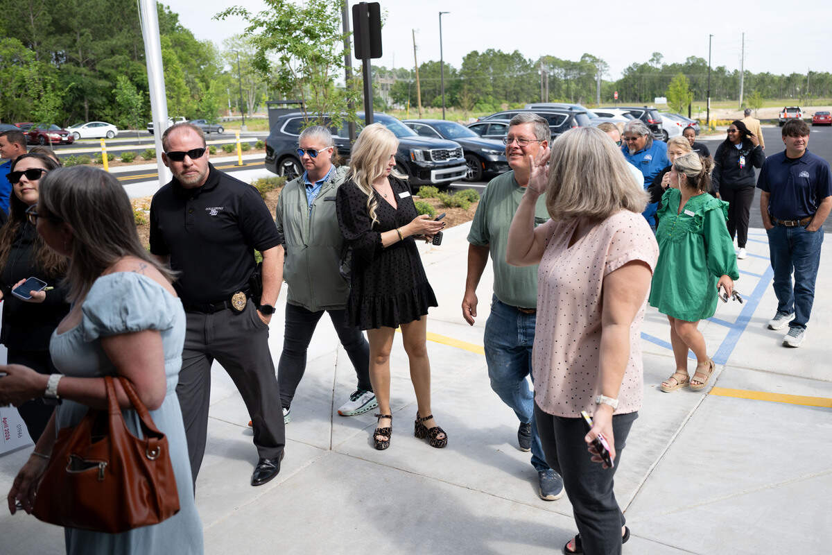 People enter the new Chick-fil-A in Ocean Springs following Wednesday’s ribbon-cutting ceremony.