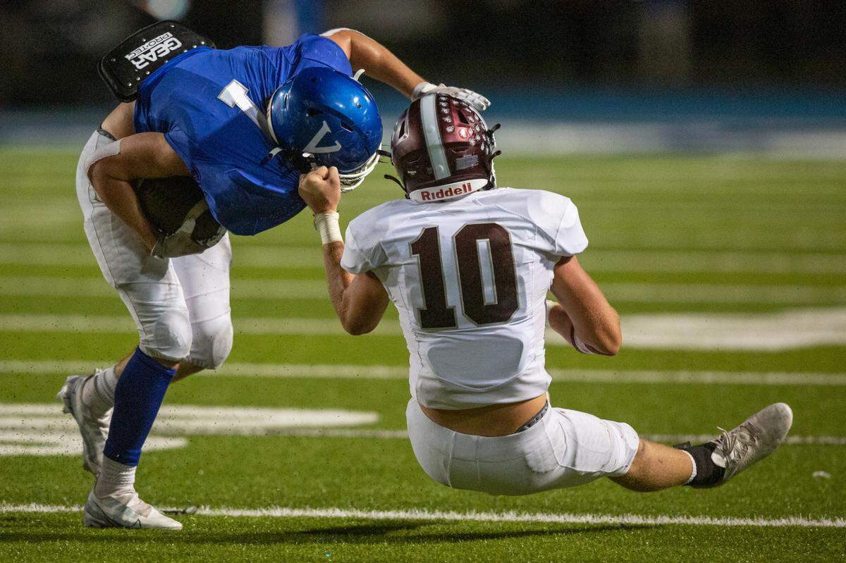 Vancleave’s John Peterson gets tackled by East Central’s Brason Owenby during a game between Vancleave and East Central at Vancleave Football Stadium in Vancleave on Thursday, Nov. 3, 2022.