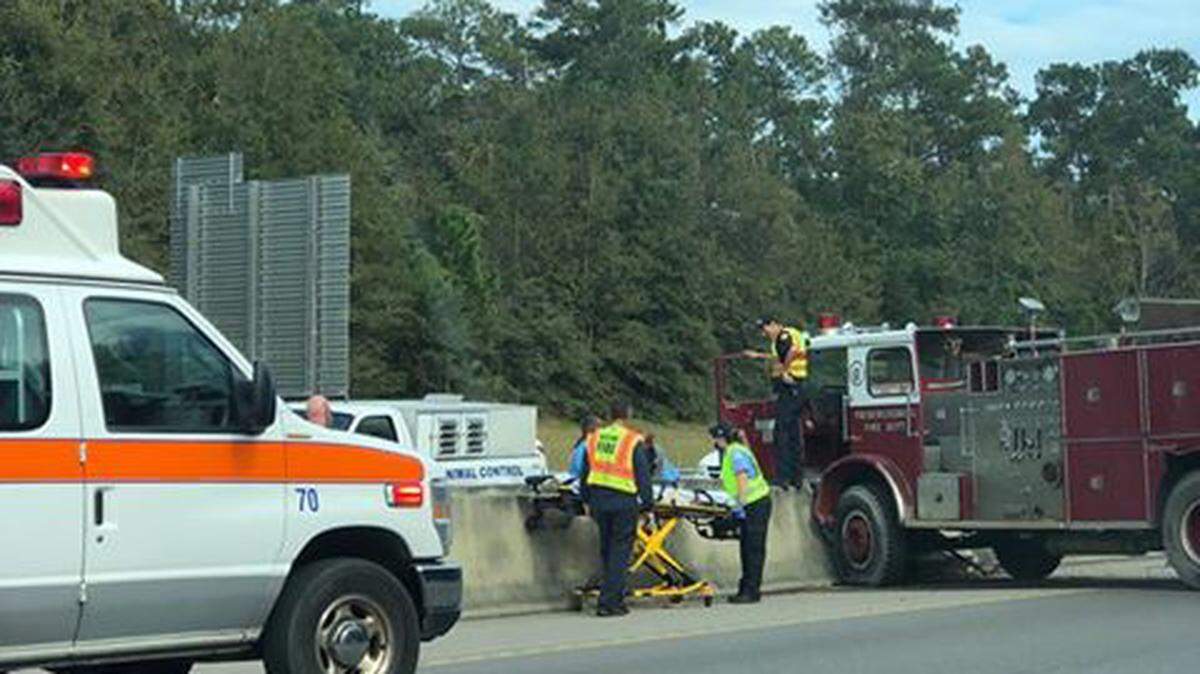 A vintage fire truck crashed into the center guard rail on Interstate 10 in Biloxi on Monday, Nov. 19, 2018.