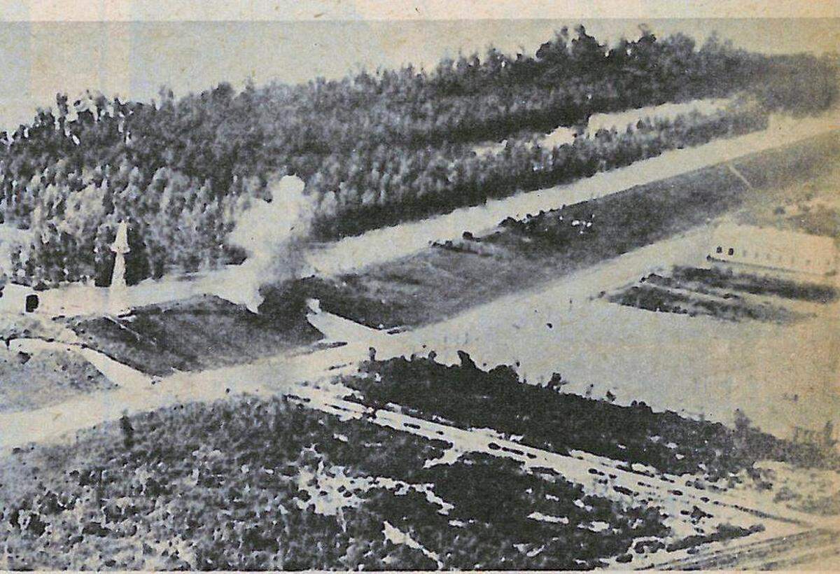 Dynamite explodes to widen the gap in the Mississippi River at Caernarvon in 1927 and relieve the threat of flooding upriver in New Orleans.