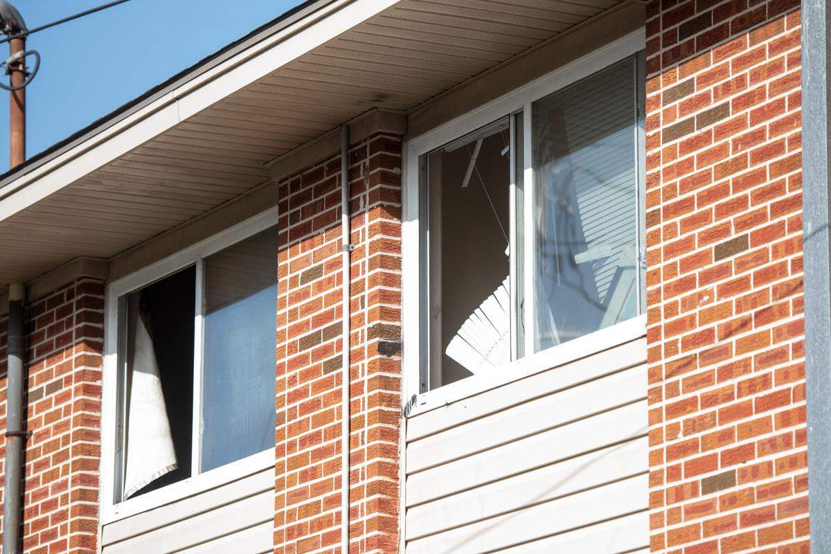 Broken windows in the upstairs apartments of the I building of the William Bell Apartments in Gulfport where a fire killed two and injured 5, two of them critically, in the early hours of Wednesday, Jan. 25, 2023. The fire started in one of the apartments, but smoke spread to the neighboring unit, causing 5 adults and 2 kids to flee from the neighboring apartment.
