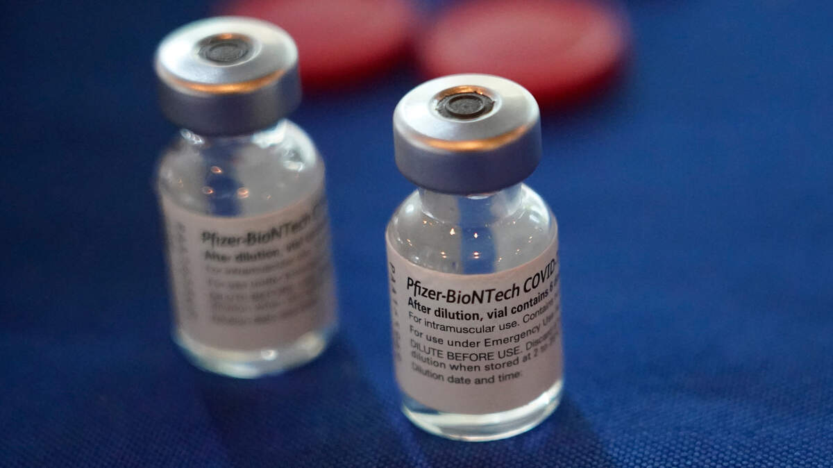 Empty bottles of the Pfizer COVID-19 vaccine await disposal by a nurse with the Jackson-Hinds Comprehensive Health Center in Jackson, Miss., across the street from Jackson State University, Tuesday, Sept. 21, 2021.