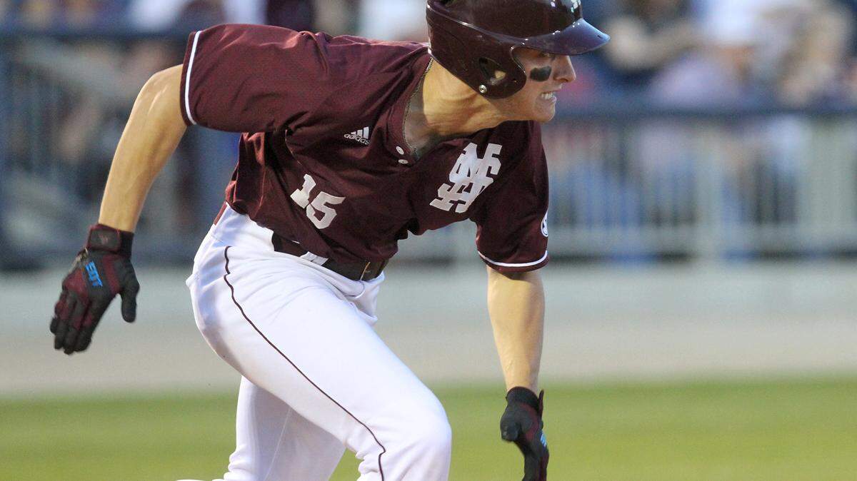 JOHN FITZHUGH/SUN HERALDMississippi State's Jake Magnum runs to first during the second inning of their game against University of Louisiana-Monroe at MGM Park in Biloxi on Wednesday April 20, 2016.