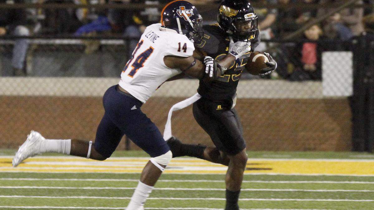 TIM ISBELL/SUN HERALDSouthern Miss running back Ito Smith is brought down by UTSA's C. J. Levine, Saturday, Oct. 17, 2015. 