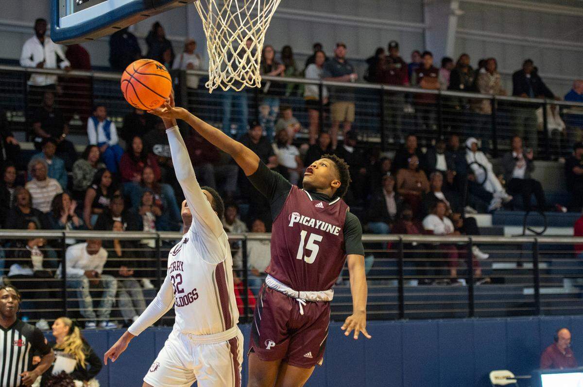 Picayune’s Sanchez Goss gets the ball knocked out of his hands during quarterfinals for Mississippi high school basketball playoffs against Terry at Mississippi Gulf Coast Community College in Perkinston on Friday, Feb. 23, 2024.