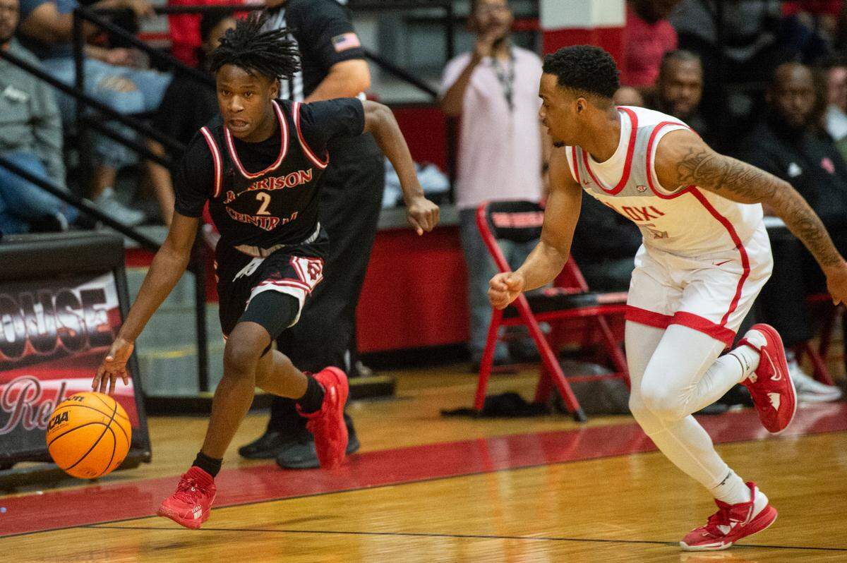 Harrison Central’s Aujaylen Barron dribbles the ball down the court during the district title game at Harrison Central High School in Gulfport on Friday, Feb. 10, 2023.