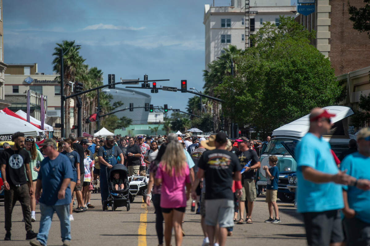 Visitors attend View the Cruise in downtown Gulfport on Sunday, Oct. 3, 2021.