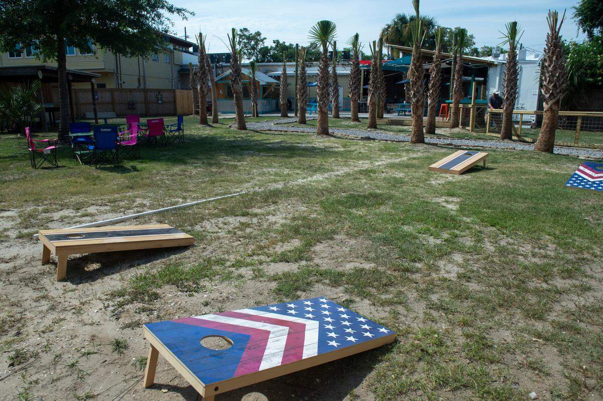 Corn hole games re part of the new Back Yard beer garden, which will have other games like darts and horseshoes, as well a bar, a sandbox for children, a dog pen for dogs and an outdoor kitchen.