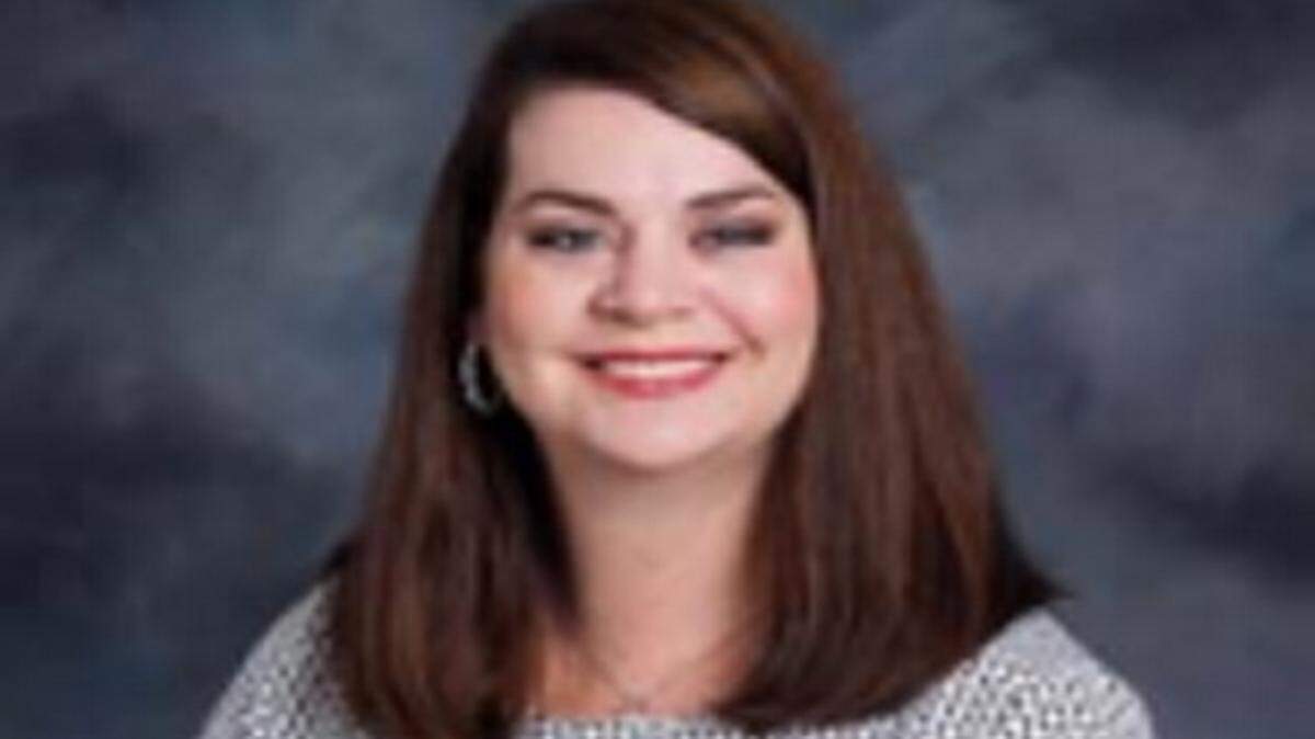 Adelle Register, the principal of Ocean Springs Middle School, was chosen as administrator of the year.