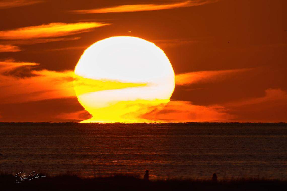 This image was taken just a minute before the sun appeared to explode over the Gulf of Mexico.