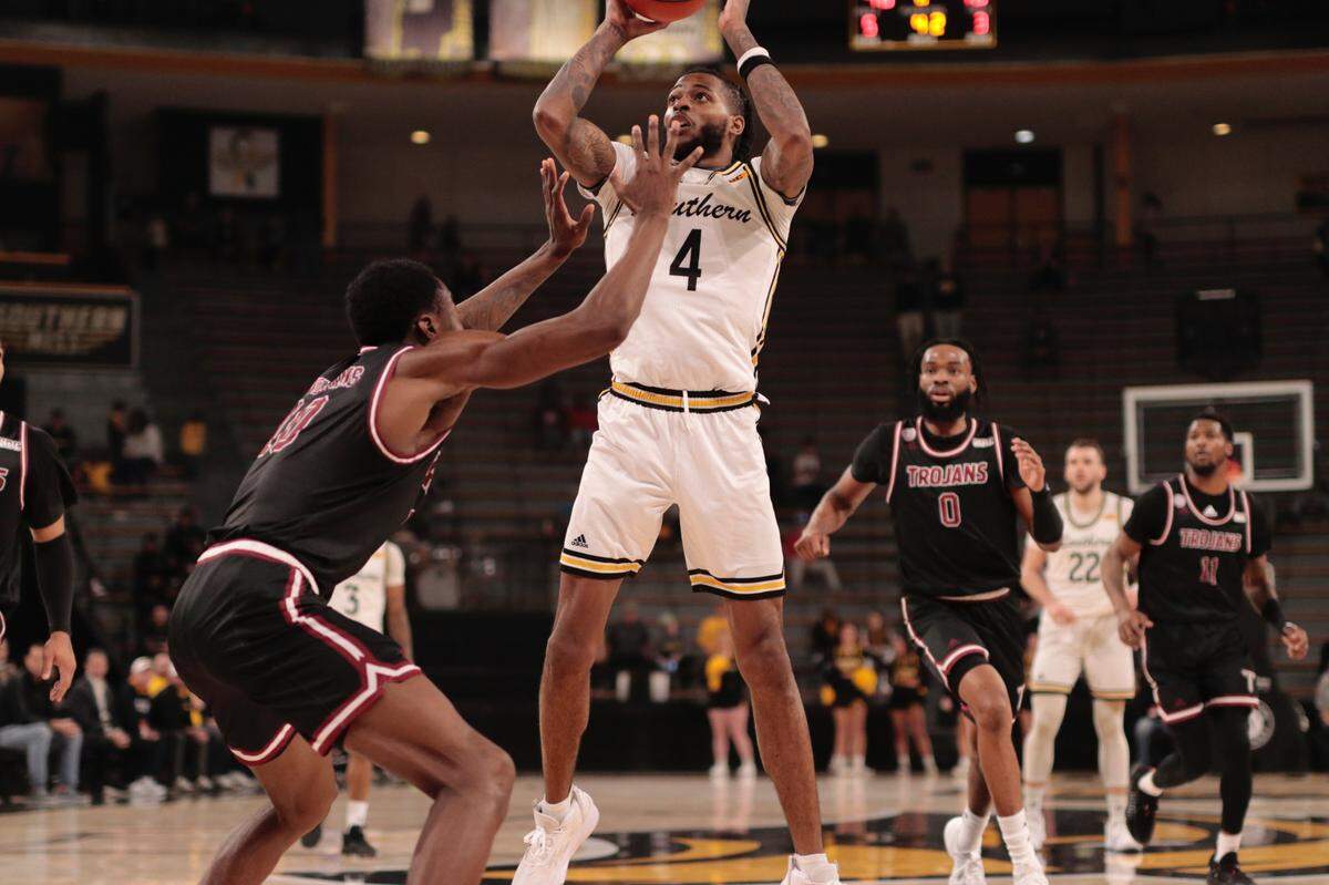 Southern Miss forward Denijay Harris rises for a shot against Troy on Dec. 29, 2022.