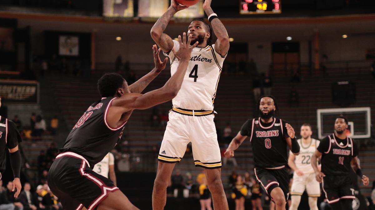 Southern Miss forward Denijay Harris rises for a shot against Troy on Dec. 29, 2022.