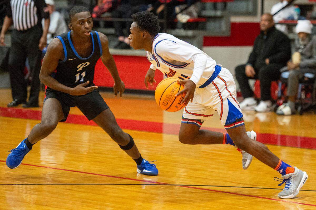 Gulfport’s Denzel Jackson dribbles the ball during a game between Pascagoula and Gulfport at Harrison Central High School on Saturday, Jan. 25, 2025.