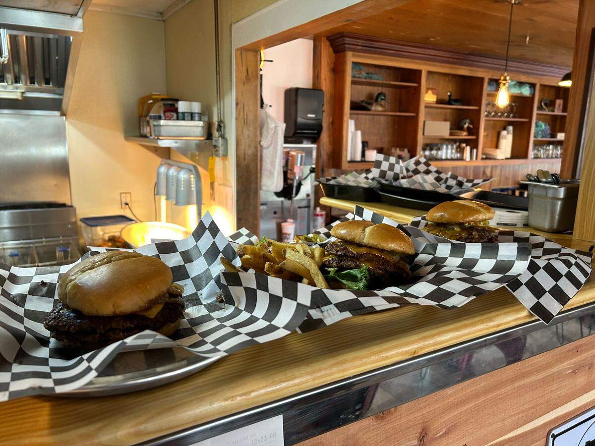 The burgers are served fresh off the grill at The Camphouse Burger Bar in Long Beach, Mississippi.