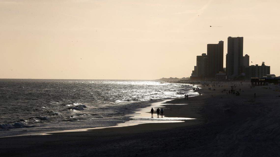 Beachgoers helped to find roughly 68 pounds of drugs that washed ashore in Gulf Shores, Alabama, officials said. (AP Photo/Gerald Herbert)