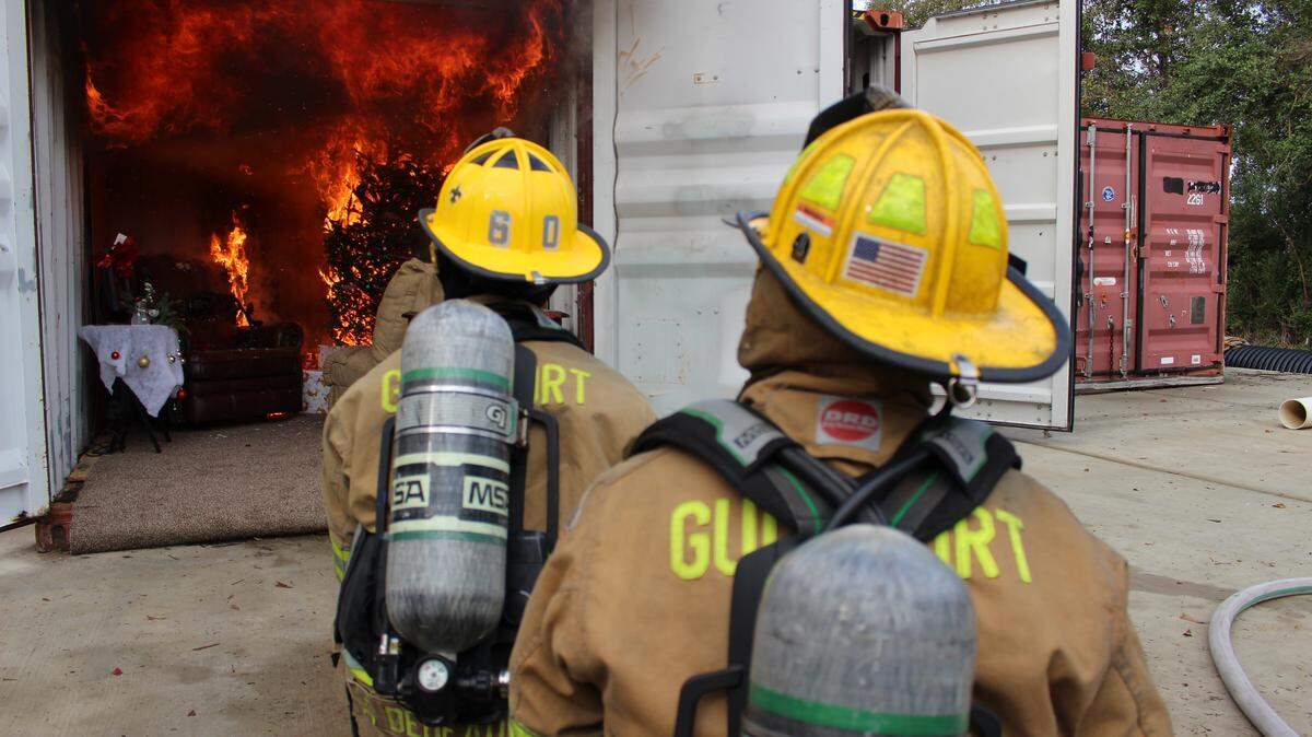 JEFF CLARK/SUN HERALD 
 The Gulfport Fire Department shows how quickly a fire started by Christmas decorations can spread during a Thursday demonstration.