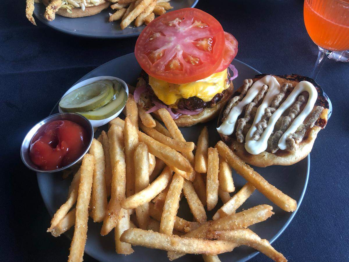 The house ground burger at Evergreen, a new restaurant concept replacing Charred, in Ocean Springs on Thursday, Sept. 28, 2023.