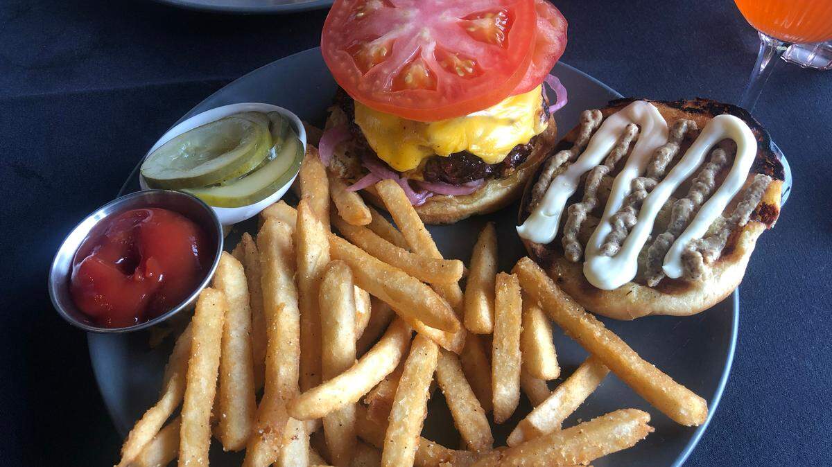 The house ground burger at Evergreen, a new restaurant concept replacing Charred, in Ocean Springs on Thursday, Sept. 28, 2023.