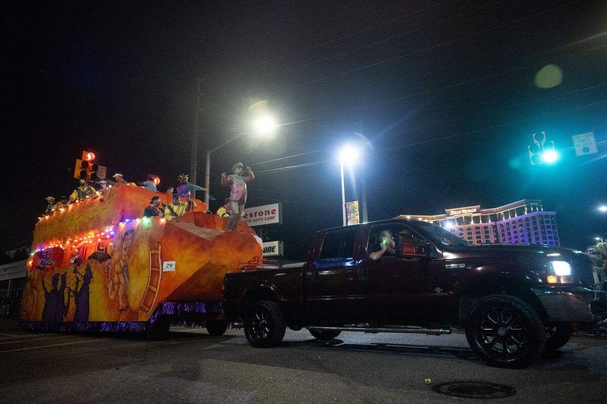 Parade floats pass by during the Krewe of Neptune parade in Biloxi on Saturday, Feb. 14, 2026.