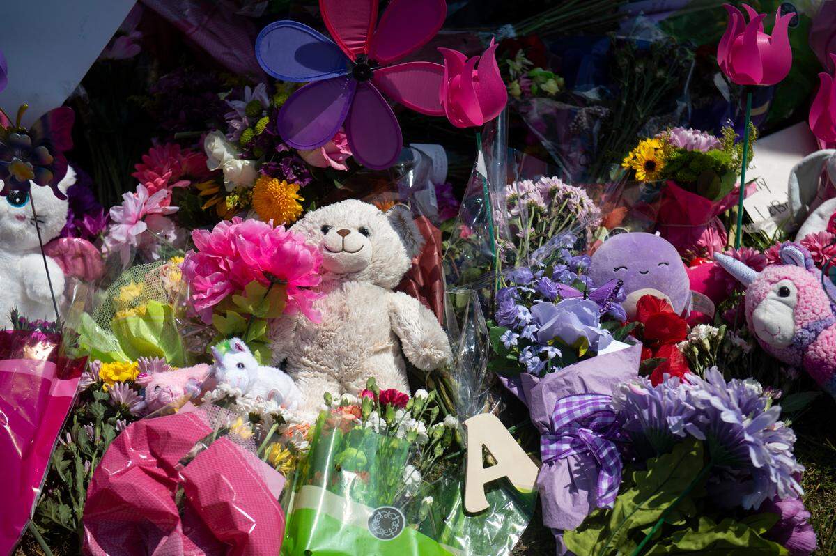 Flowers and toys are left outside the Ocean Springs Middle School in Ocean Springs on Thursday, Sept. 7, 2023, in memory of Aubreigh Wyatt, who died unexpectedly last week.