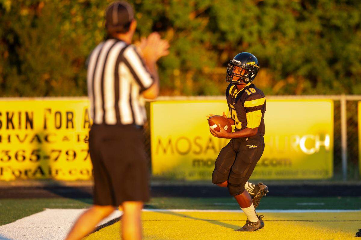 Tyler Hunter, the student manager for D’Iberville’s JV football team, scores a touchdown in a game against St. Martin at Warrior Stadium in D’Iberville on Monday, Oct. 9, 2023. Hunter, who has an intellectual disability, played for two of the game’s plays, scoring two touchdowns.