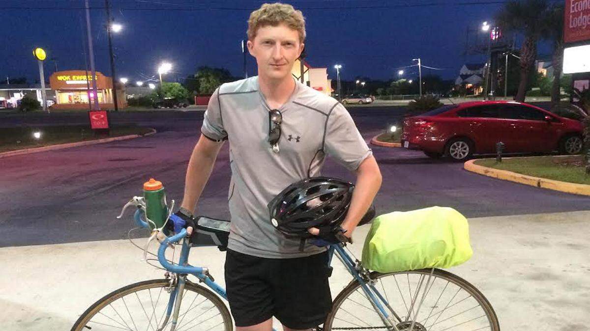 REGINA ZILBERMINTS/SUNHERALD 
 Benjamin Morris stands outside a Gulfport hotel on Sunday, May 22, 2016. He is one day away from completing a 500-mile bike ride to protest HB 1523.