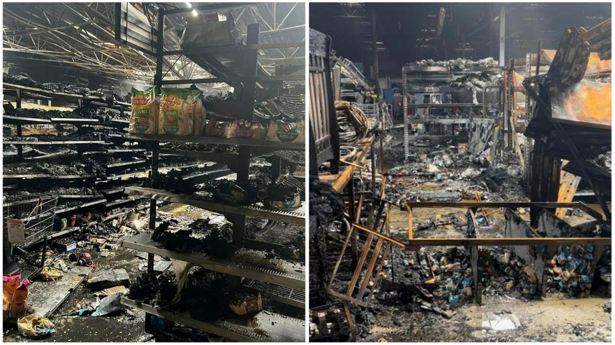 Part of the roof caved in and three police officers were taken to a hospital as crews battled a large fire that started inside a Walmart in Peachtree City, Georgia, on Aug. 24, fire officials said.