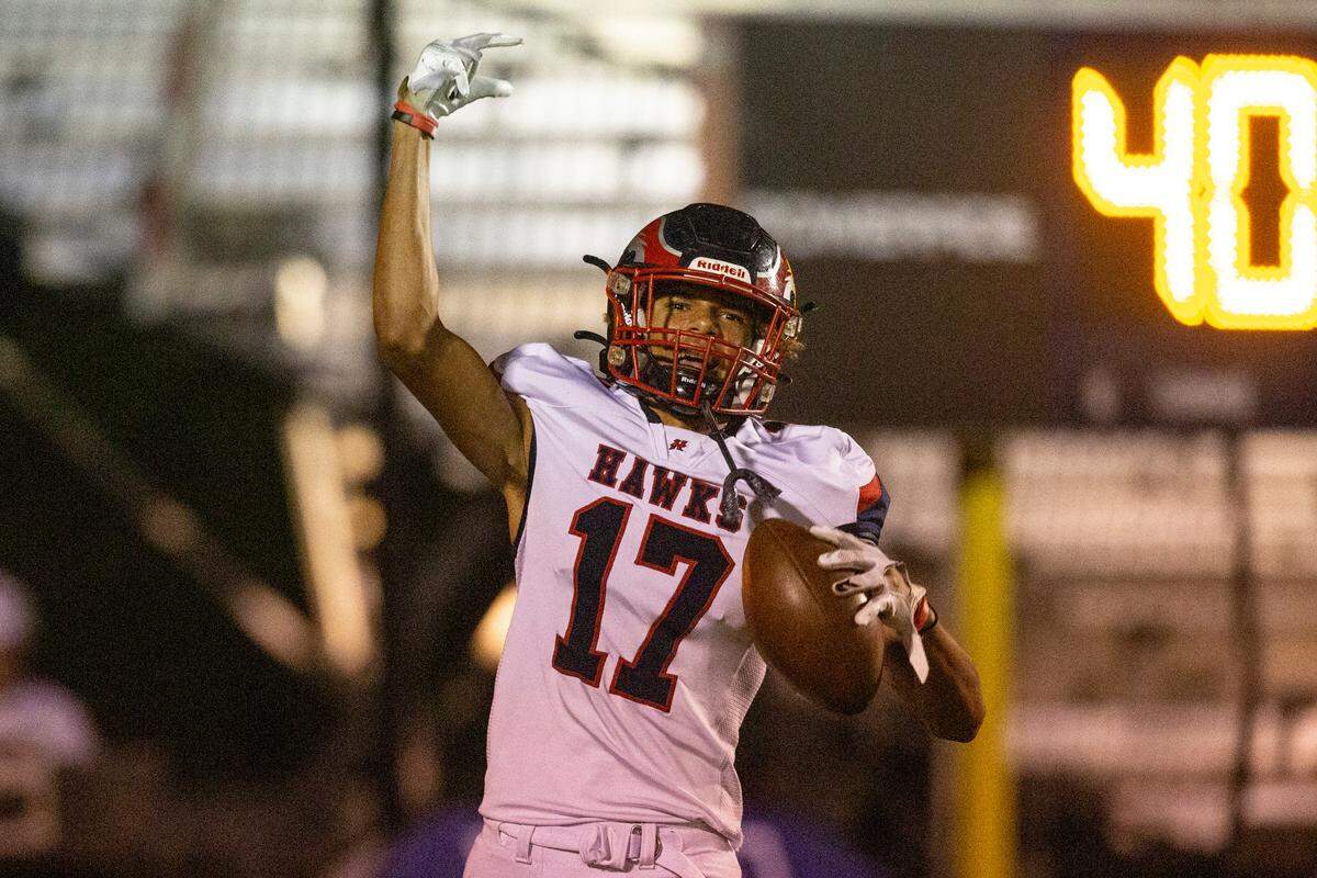 Hancock’s Neil Acker celebrates after scoring a touchdown during a game against St. Martin at Joe Barlow Stadium in St. Martin on Friday, Sept. 30, 2022.