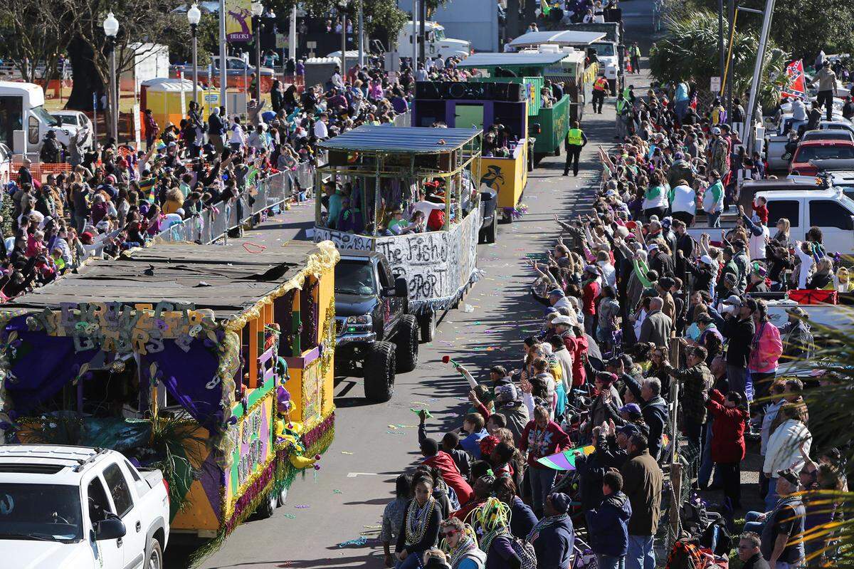 JOHN FITZHUGH/SUN HERALDThe Gulf Coast Carnival Association Mardi Gras Parade rolls up Lemeuse Street in Biloxi on Tuesday Feb. 9, 2016.