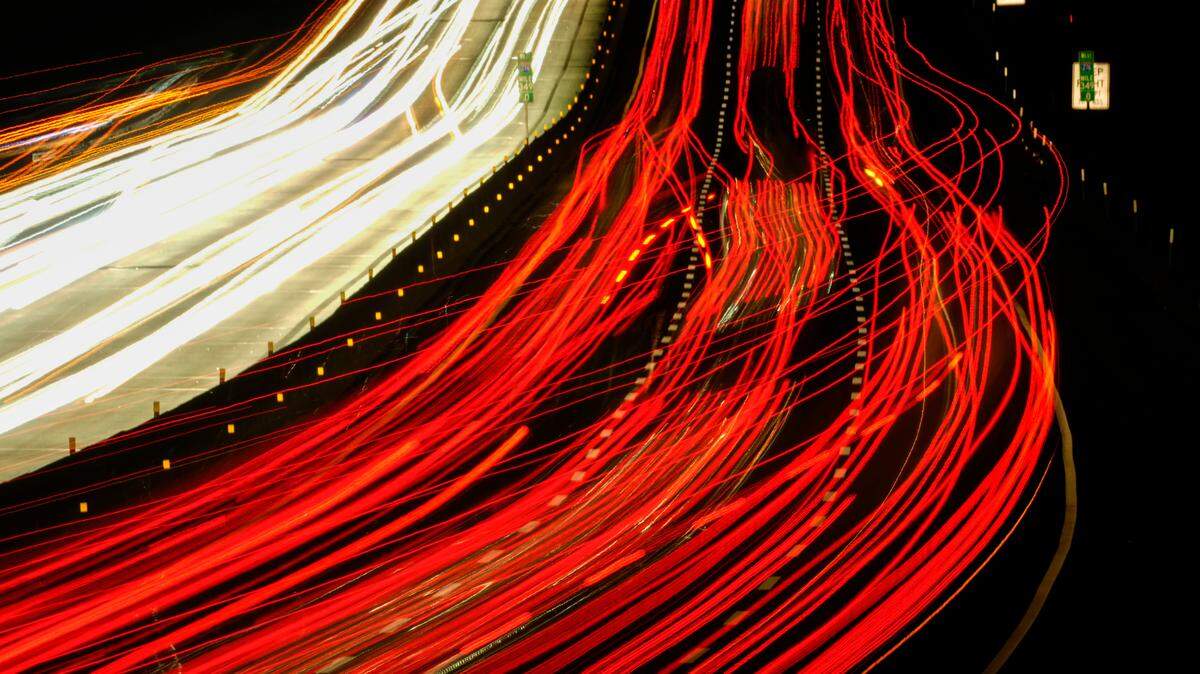 In this long exposure photo, motor vehicles move Thursday along Interstate 276 in Feasterville, Pa.