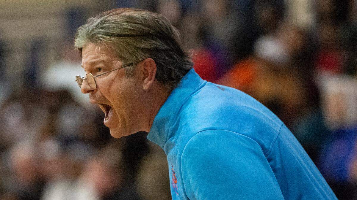 Gulfport Mens Basketball Head Coach Owen Miller yells from the sidelines during a game against Biloxi at Gulfport High School in Gulfport on Friday, Jan. 13, 2023.