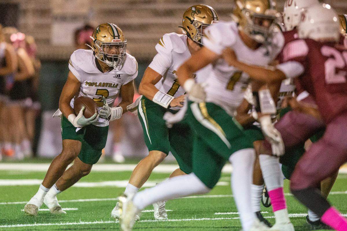 Poplarville runningback Maurice Travis runs the ball down the field during a game against Lawrence County at Poplarville High School in Poplarville on Friday, Oct. 7, 2022.