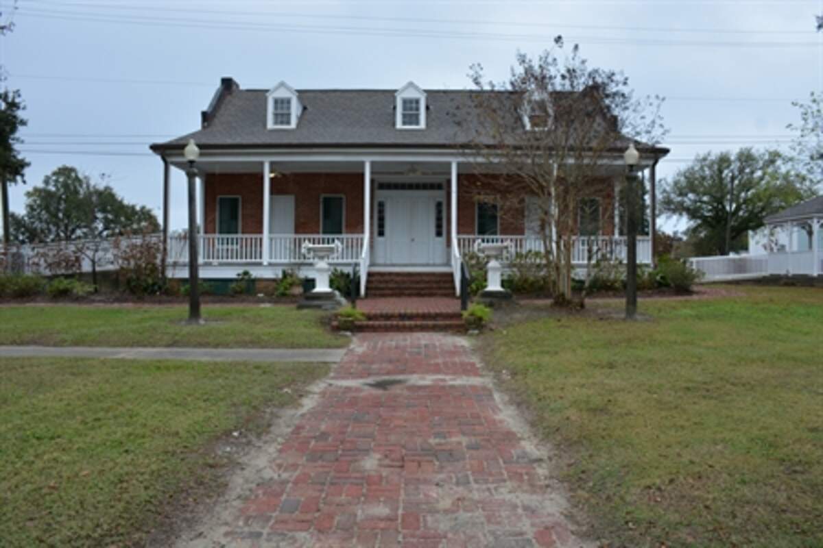 Locals claim that the ghost of a man from the 1800s can be seen smoking his cigar on the front porch of the Old Brick House in Biloxi.