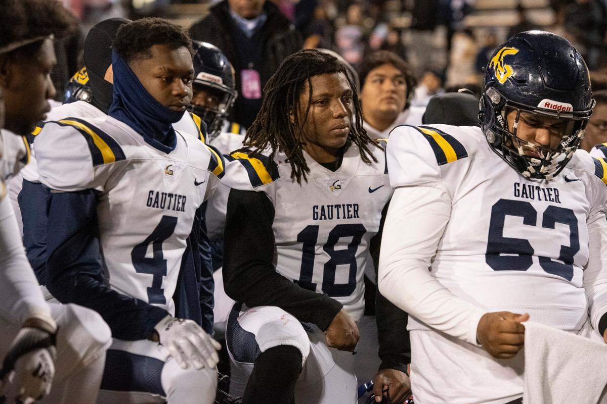 Gautier players react after Gautier lost the MSHAA Class 5A Football Championship at M.M. Roberts Stadium in Hattiesburg on Friday, Dec. 6, 2024.