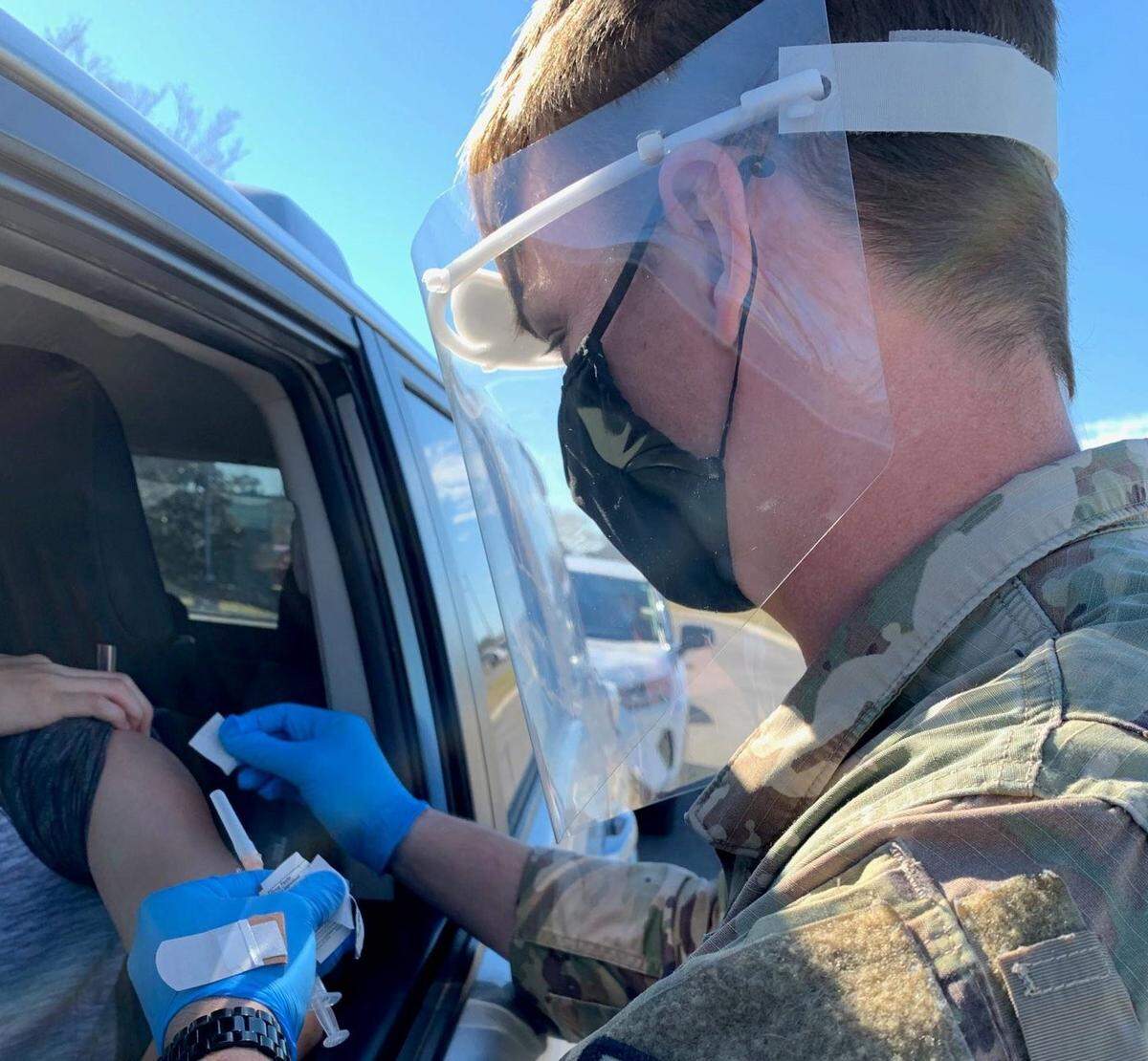 Members of the Mississippi National Guard and Mississippi State Department of Health gave vaccines to health-care workers in Pascagoula on Monday, Jan. 5, 2020, to protect against the coronavirus. It was the first day the state’s drive-thru sites were available for vaccines to health-care workers.