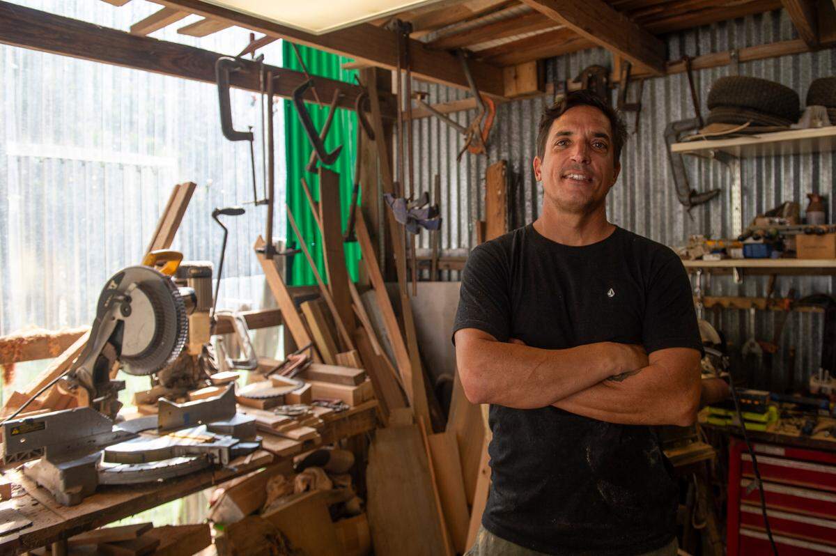 Shane Sekul’s, a woodworker, poses for a portrait at his workshop in Ocean Springs on Thursday, Oct. 24, 2024. Sekul will be recreating Walter Anderson’s Blue Jay Table for The Traveler, a new building at the Walter Anderson Museum of Art.