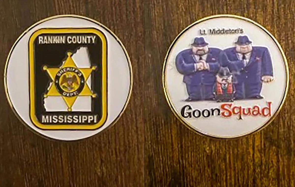 A commemorative coin that Goon Squad members carried. One side shows gangsters and name-checks a supervisor.