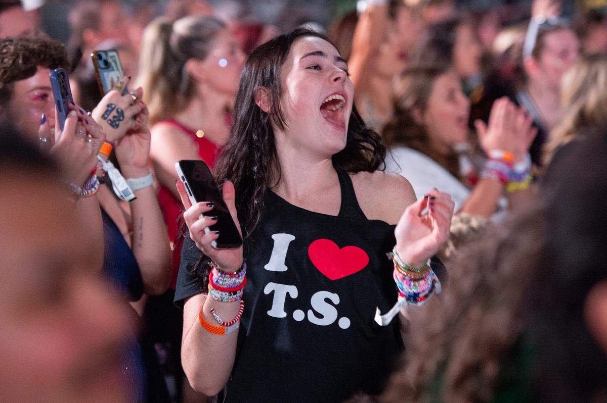 Fans cheer during Taylor Swift’s The Eras Tour at the Cesars Superdome in New Orleans on Friday, Oct. 25, 2024.