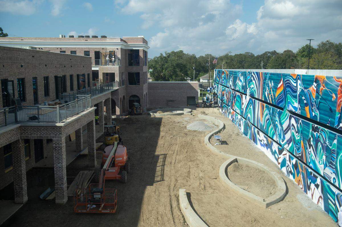 A mural by Douglas Hoekzema, also known as Hoxxoh, decorates what will be the courtyard of the new OS 1515 development in downtown Ocean Springs.