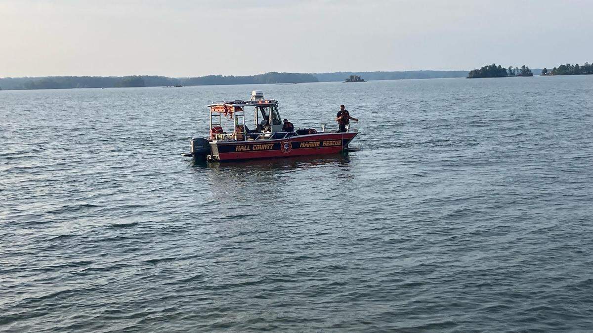 A man was in critical condition and later died after trying to swim back to shore with two friends at Lake Lanier in Hall County, Georgia.